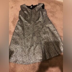 Silver shimmery a-line sleeves dress with back zipper, no pockets